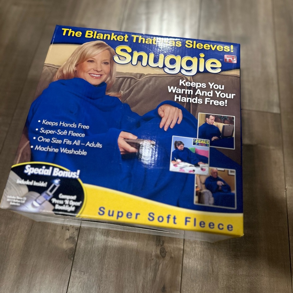 The blanket that has sleeves and a light